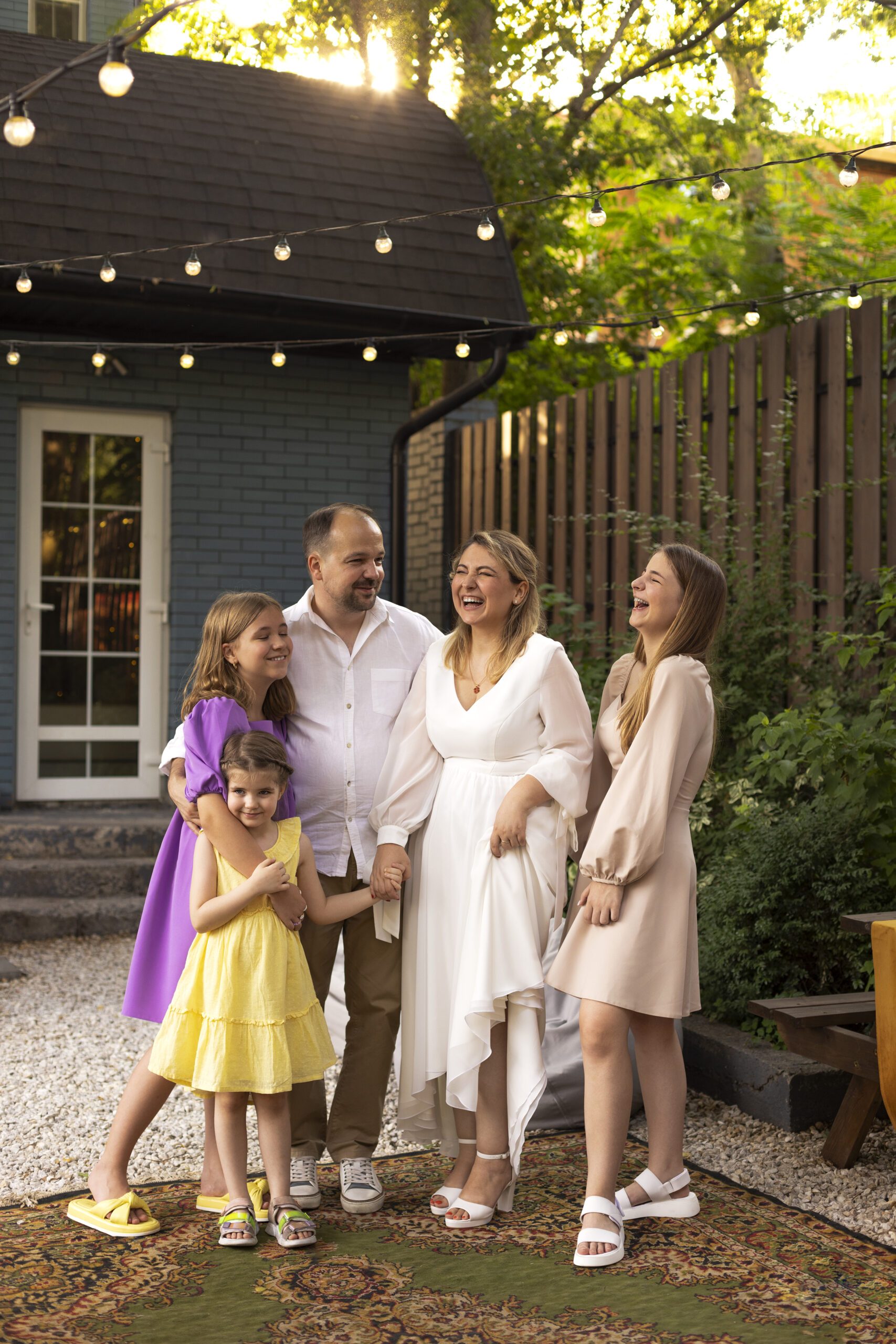 Photo of family on a wedding party for a 20 year anniversary in